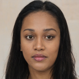 Joyful asian young-adult female with long  brown hair and brown eyes