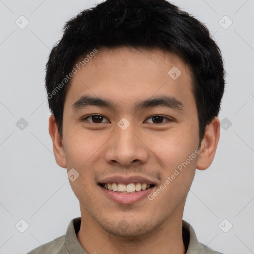 Joyful white young-adult male with short  black hair and brown eyes