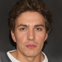 Neutral white adult male with short  brown hair and brown eyes