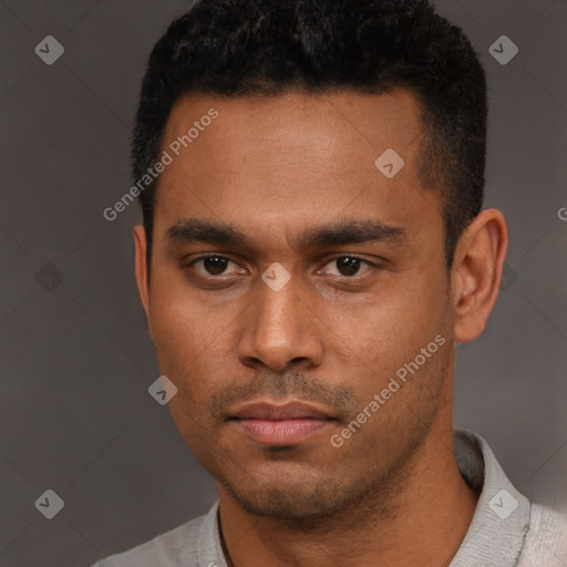 Neutral latino young-adult male with short  black hair and brown eyes