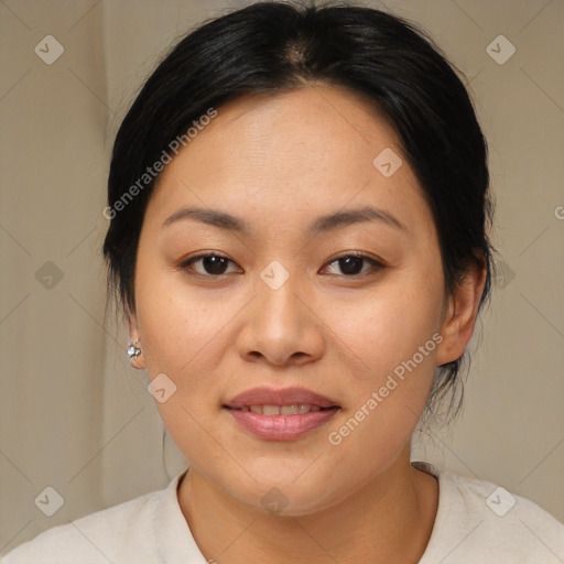 Joyful asian young-adult female with medium  brown hair and brown eyes