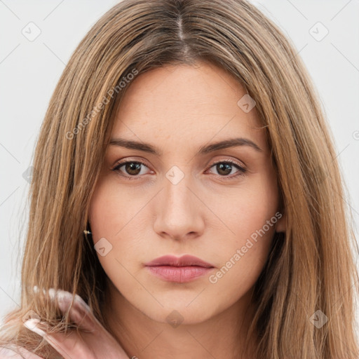 Neutral white young-adult female with long  brown hair and brown eyes