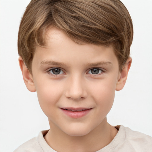 Joyful white child male with short  brown hair and brown eyes