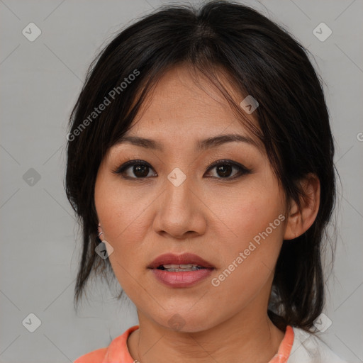 Joyful asian young-adult female with medium  brown hair and brown eyes