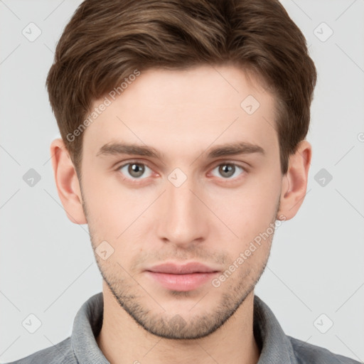 Neutral white young-adult male with short  brown hair and grey eyes