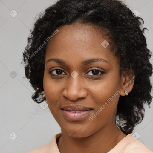 Joyful black young-adult female with medium  black hair and brown eyes