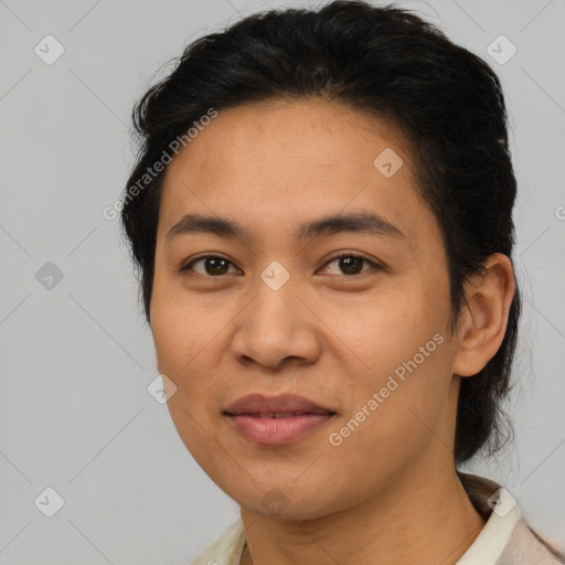 Joyful asian young-adult female with medium  brown hair and brown eyes