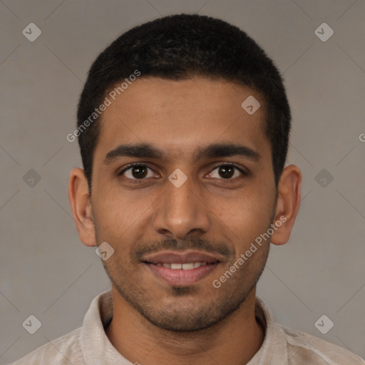 Joyful latino young-adult male with short  brown hair and brown eyes