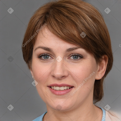 Joyful white young-adult female with medium  brown hair and blue eyes