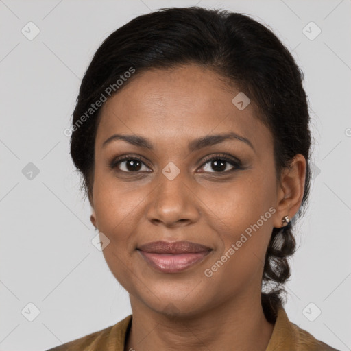 Joyful black young-adult female with medium  brown hair and brown eyes