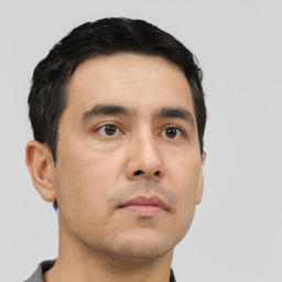 Neutral asian young-adult male with short  black hair and brown eyes