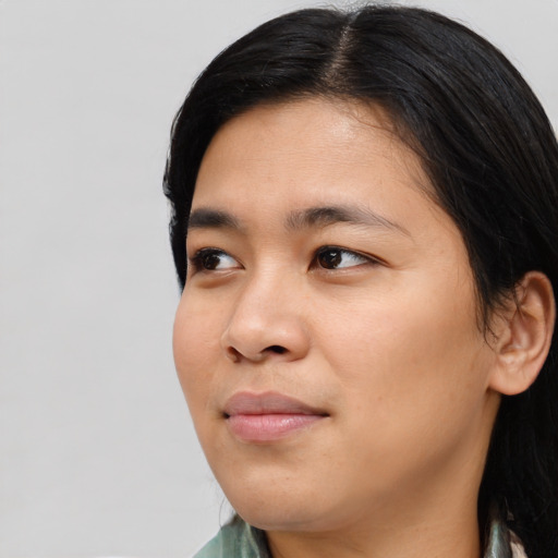 Neutral asian young-adult female with medium  black hair and brown eyes