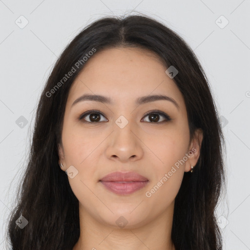 Joyful latino young-adult female with long  brown hair and brown eyes