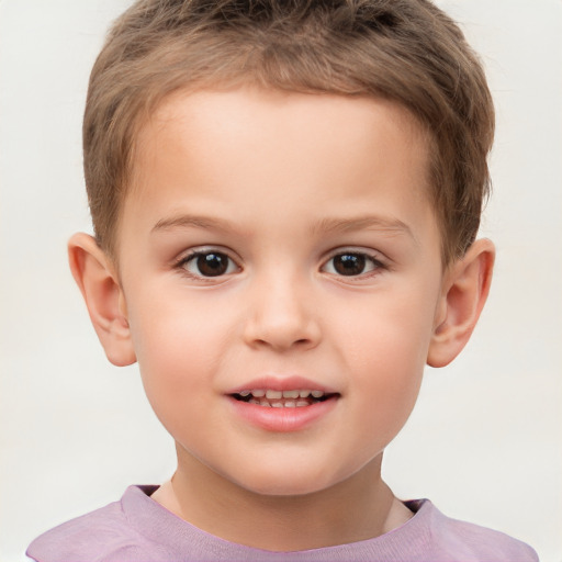 Joyful white child male with short  brown hair and brown eyes