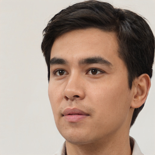 Neutral white young-adult male with short  black hair and brown eyes
