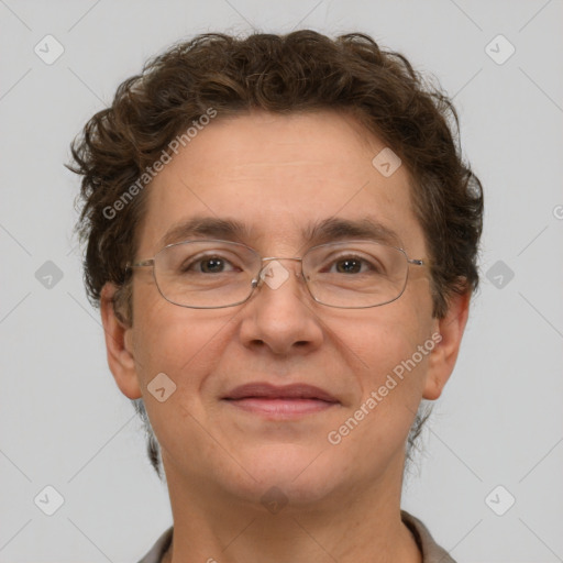 Joyful white adult male with short  brown hair and grey eyes