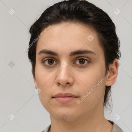 Neutral white young-adult female with short  brown hair and brown eyes