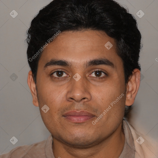 Joyful latino young-adult male with short  brown hair and brown eyes