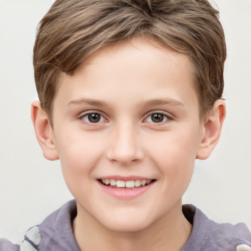 Joyful white child female with short  brown hair and grey eyes