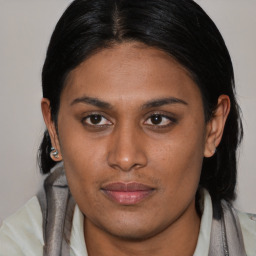 Joyful asian young-adult female with medium  brown hair and brown eyes