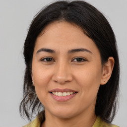 Joyful asian young-adult female with medium  brown hair and brown eyes