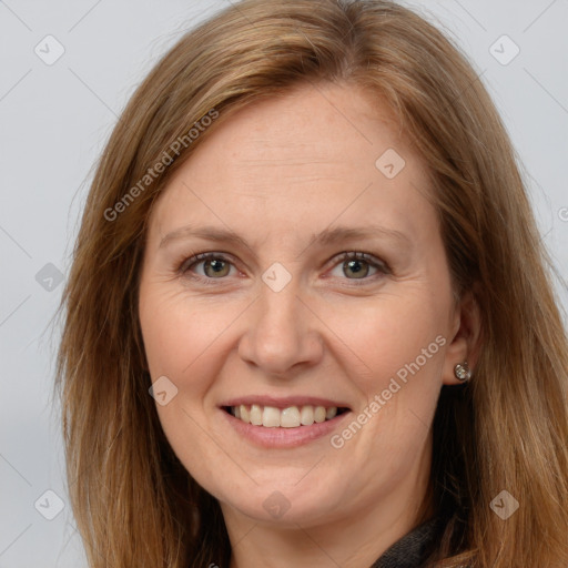 Joyful white adult female with long  brown hair and brown eyes