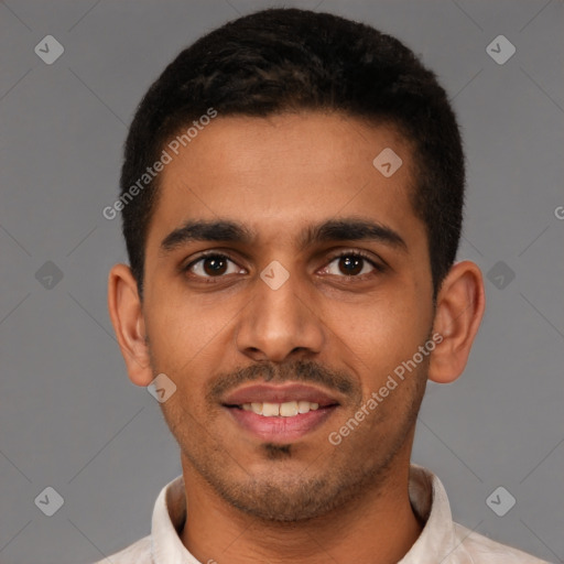 Joyful latino young-adult male with short  brown hair and brown eyes