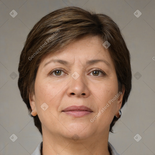 Joyful white adult female with medium  brown hair and brown eyes