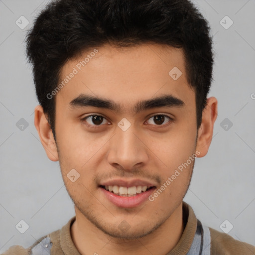 Joyful latino young-adult male with short  brown hair and brown eyes