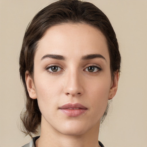 Neutral white young-adult female with medium  brown hair and brown eyes