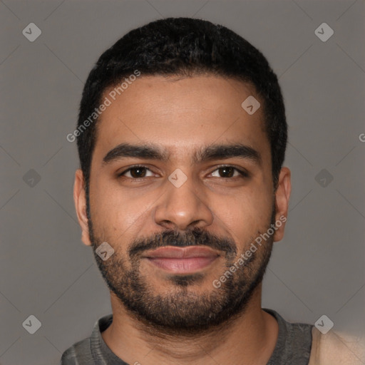 Joyful latino young-adult male with short  brown hair and brown eyes