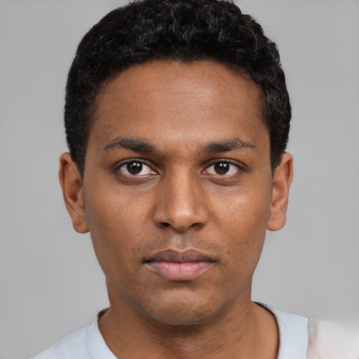 Neutral black young-adult male with short  black hair and brown eyes