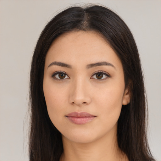 Neutral latino young-adult female with long  brown hair and brown eyes