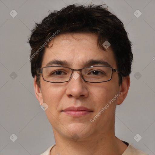 Joyful white adult male with short  brown hair and brown eyes