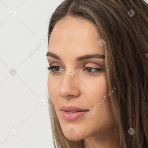 Neutral white young-adult female with long  brown hair and brown eyes