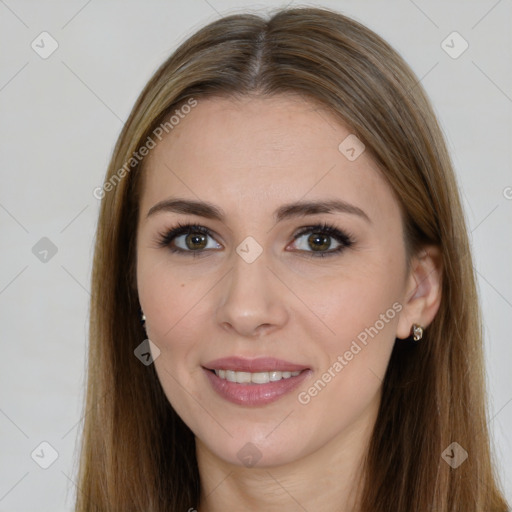 Joyful white young-adult female with long  brown hair and brown eyes