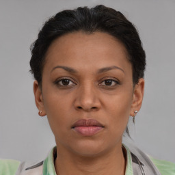 Neutral black young-adult female with short  brown hair and brown eyes