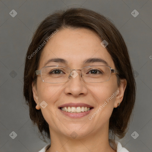 Joyful white adult female with medium  brown hair and brown eyes