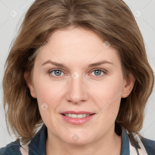 Joyful white young-adult female with medium  brown hair and blue eyes