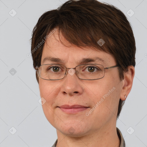 Joyful white adult female with short  brown hair and brown eyes