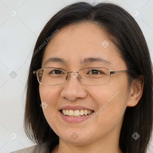 Joyful white adult female with medium  brown hair and brown eyes