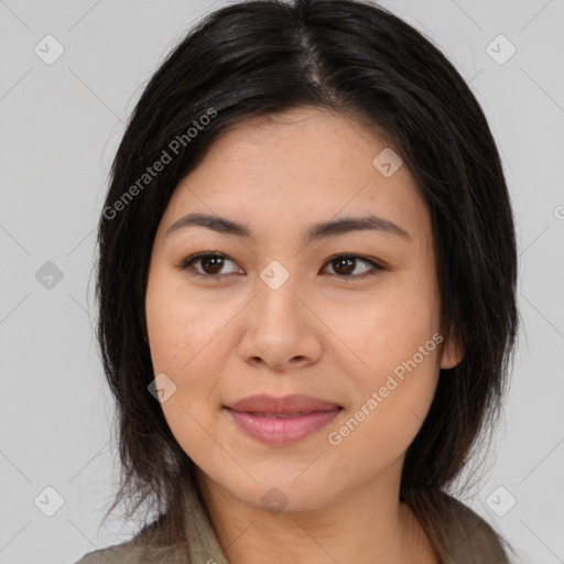 Joyful asian young-adult female with long  brown hair and brown eyes