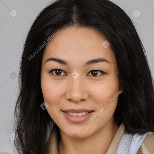 Joyful asian young-adult female with long  brown hair and brown eyes