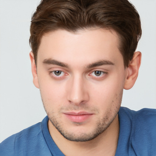 Neutral white young-adult male with short  brown hair and brown eyes