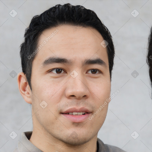 Joyful asian young-adult male with short  black hair and brown eyes