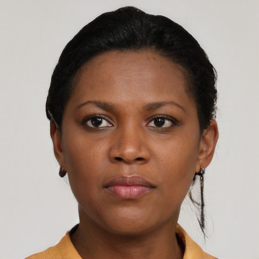 Neutral black young-adult female with short  black hair and brown eyes