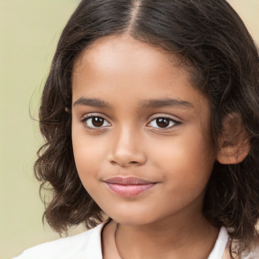 Joyful white child female with medium  brown hair and brown eyes