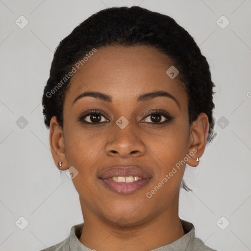 Joyful black young-adult female with short  black hair and brown eyes