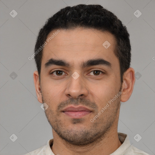 Neutral latino young-adult male with short  black hair and brown eyes