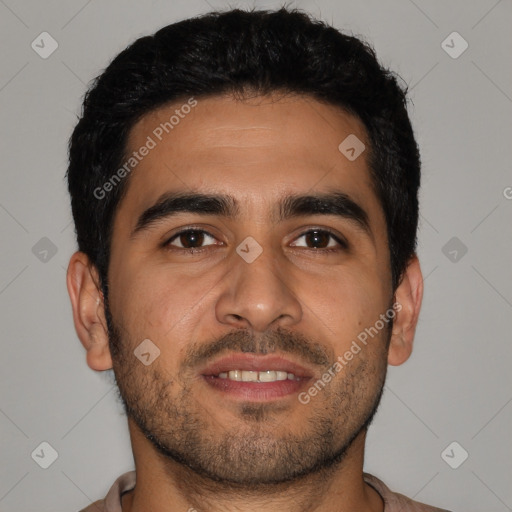 Joyful latino young-adult male with short  black hair and brown eyes